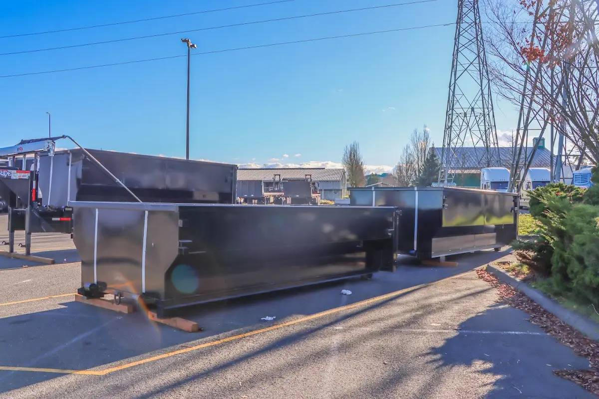 Roll-off dumpster ready for waste disposal at job site for 12 Yard Dumpster Rental in Buda
